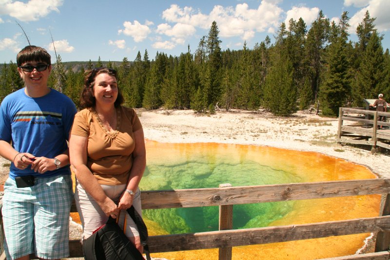 Trip (92).JPG - Kris and Sharon at Morning Glory Pool at Yellowstone National Park geyser basin